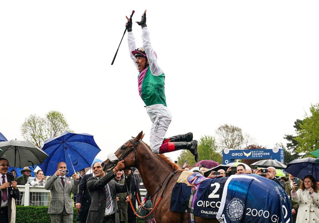 Jockey Frankie Dettori jumps off of Chaldean after winning the Qipco 2000 Guineas Stakes on day two of The QIPCO Guineas Festival at Newmarket Racecourse. Picture date: Saturday May 6, 2023.